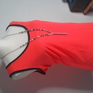 Full Beauty Sports neon orange and black tank top